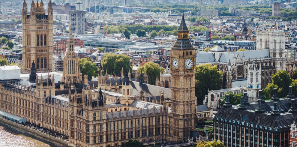 Beautiul outdoor view of Big Ben and Westmisnter bridge in London. Busy city. Horizontal shot of wonderful historical monuments. Sightseeing and tourism concept.