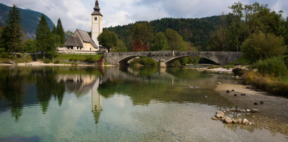 Bohinj lake with church in Slovenia